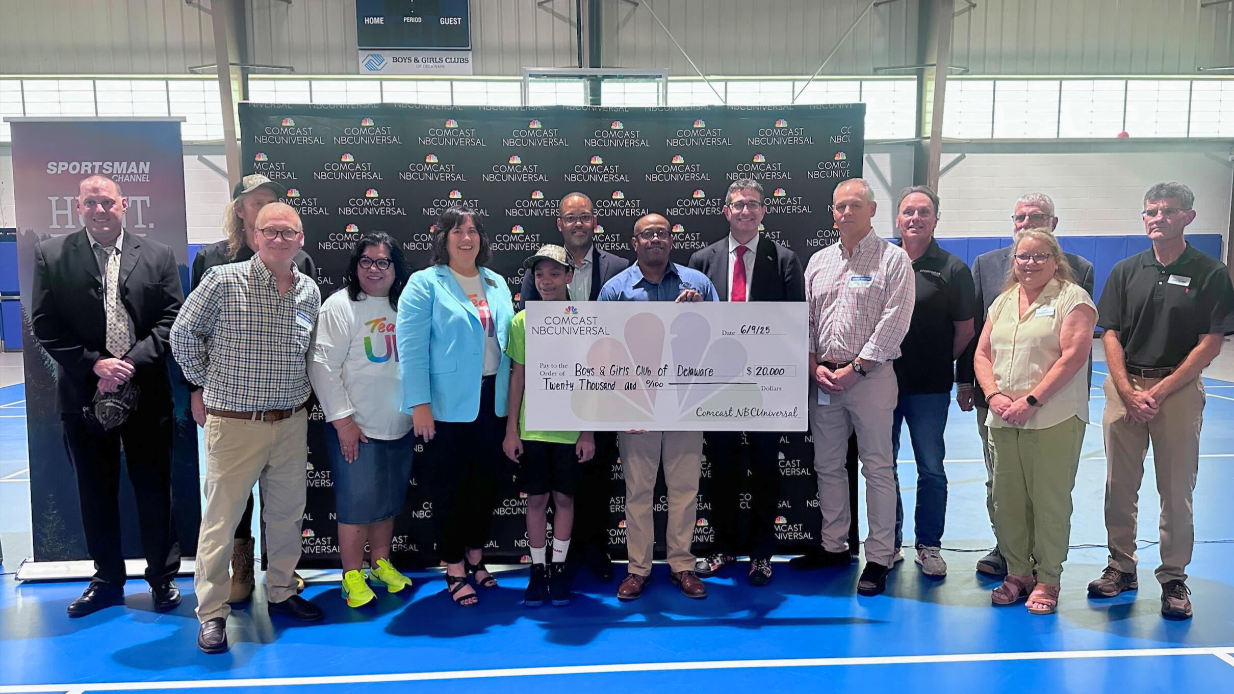 Group providing a donation check to Boys and Girls Club